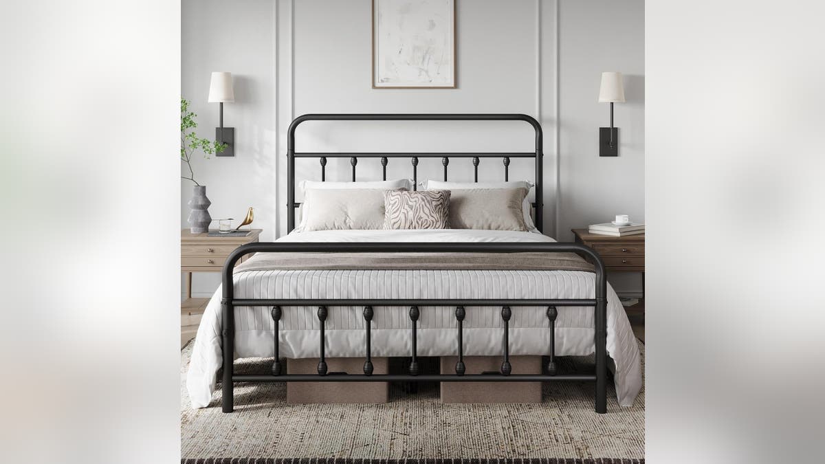 A farmhouse-style bed frame makes a great centerpiece for your bedroom. 