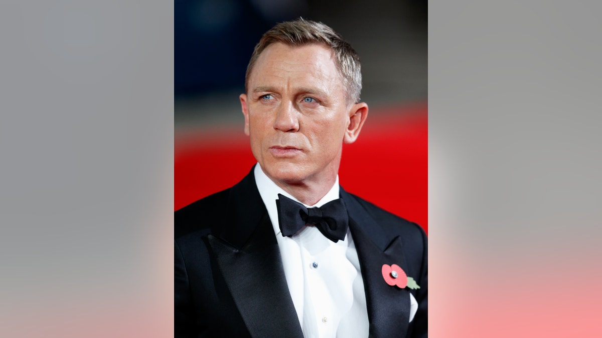 Daniel Craig sports black bowtie at Spectre premiere.